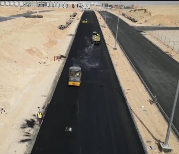 Aerial view of a new road being paved
